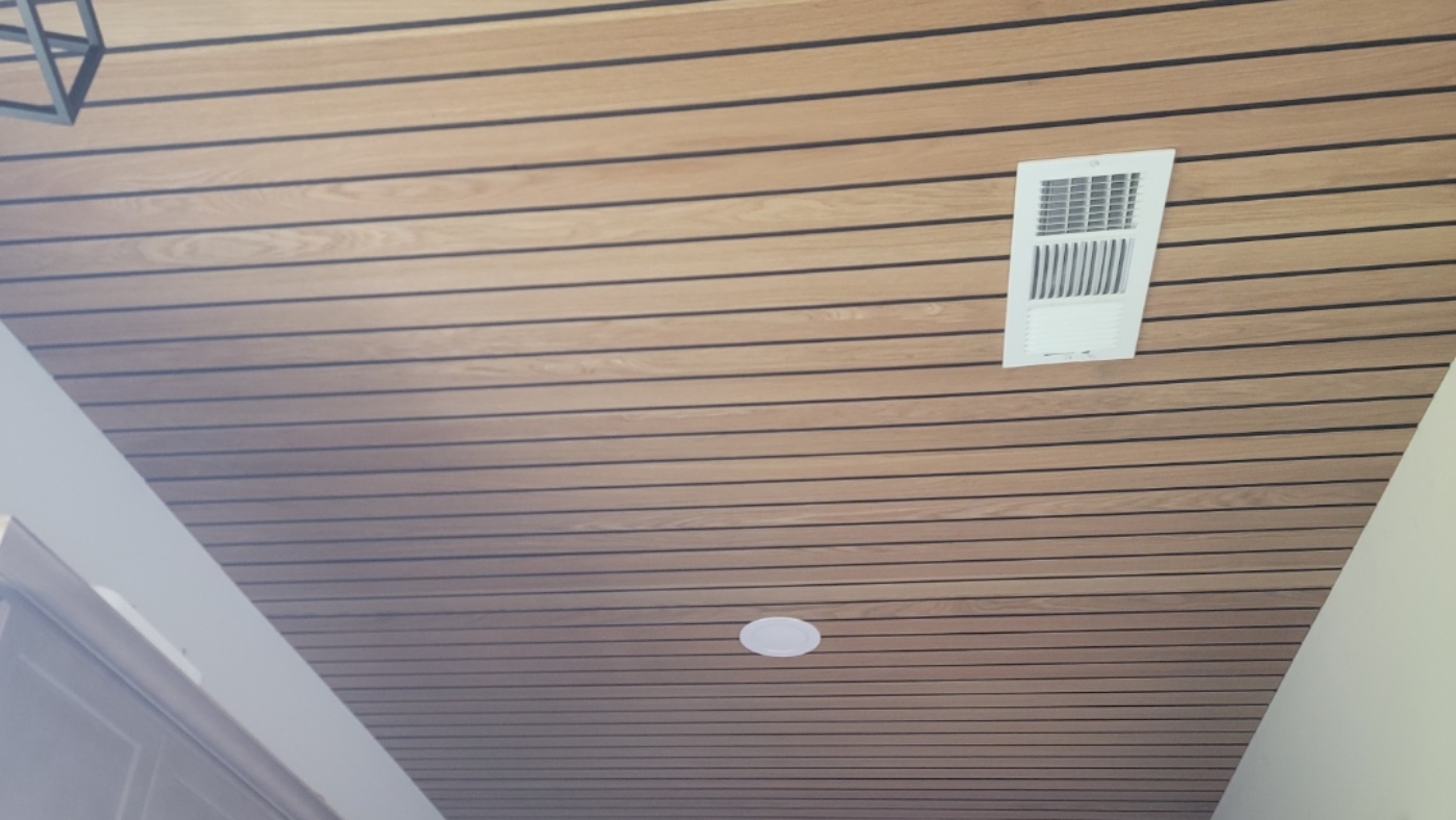 White oak slat ceiling above a kitchen