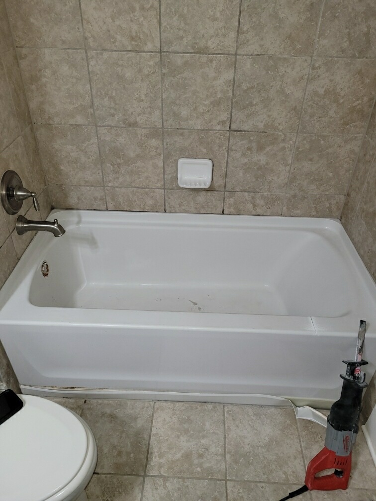 Before: the original tub