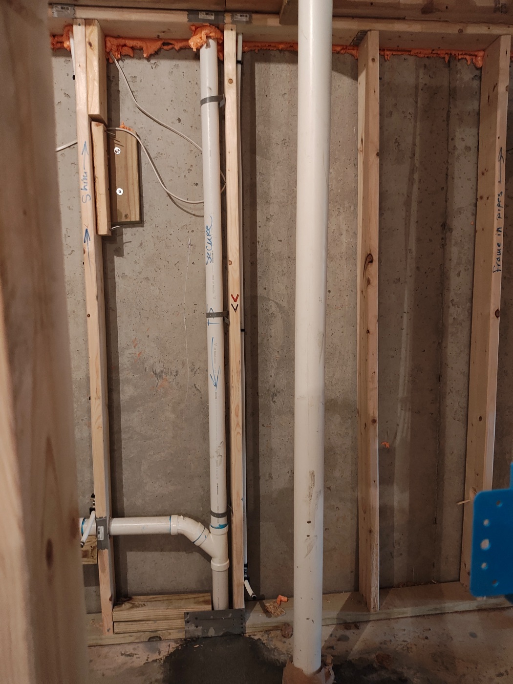 Pipe chase sealed where the lines cross the plate