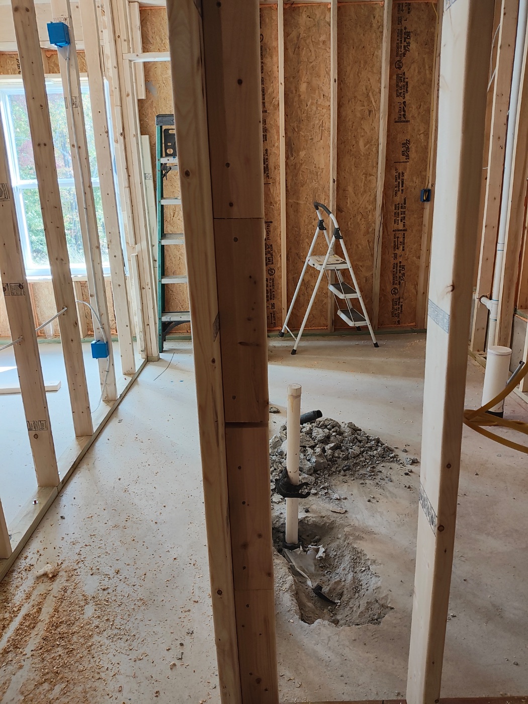 Stub through the slab in the framed bath